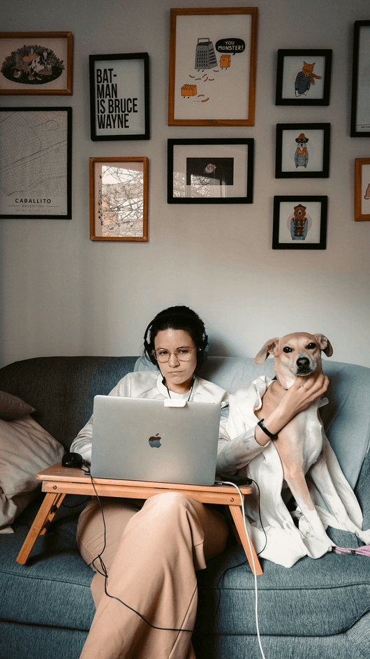 Woman and dog working from home